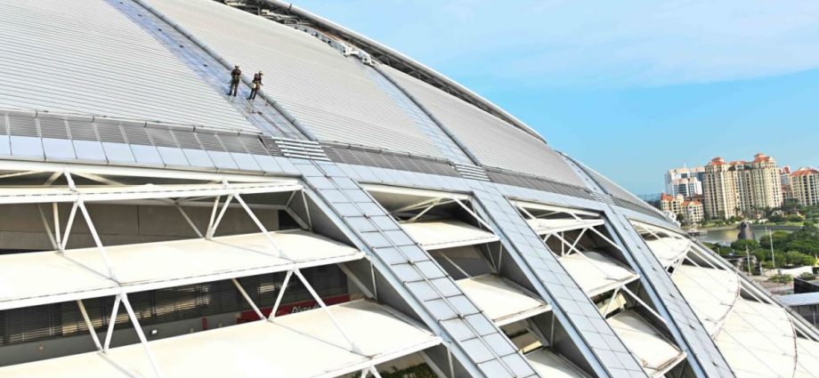 What does it take to clean the world’s largest dome? Men suspended by ropes