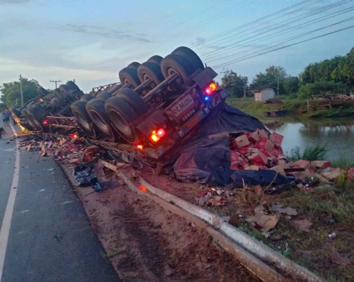 Beer truck overturns, driver killed