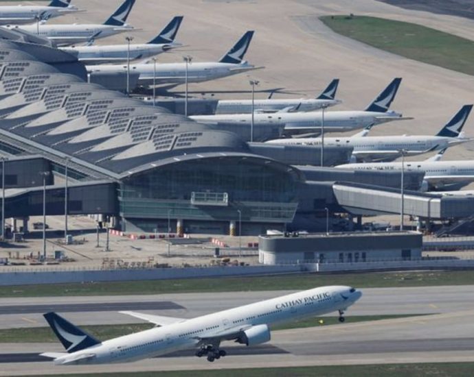 Cathay Pacific narrows loss, outlook clouded by crew COVID-19 rules