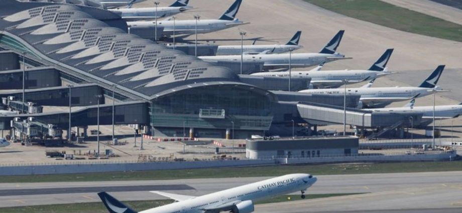 Cathay Pacific narrows loss, outlook clouded by crew COVID-19 rules
