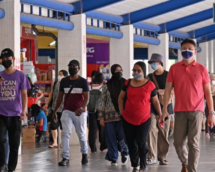 Commentary: Low risk of getting COVID-19 from indoor places – even with masks off