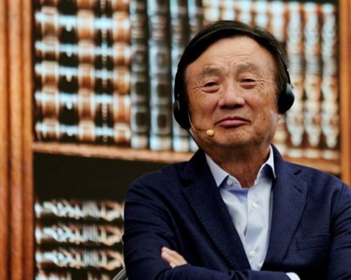 Founder of China’s Huawei urges focus on cash flow, survival in downturn