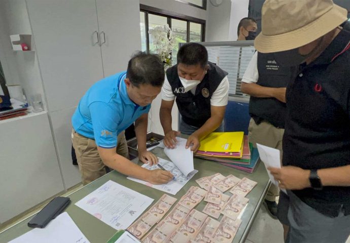 Gun permit bribery suspect transferred