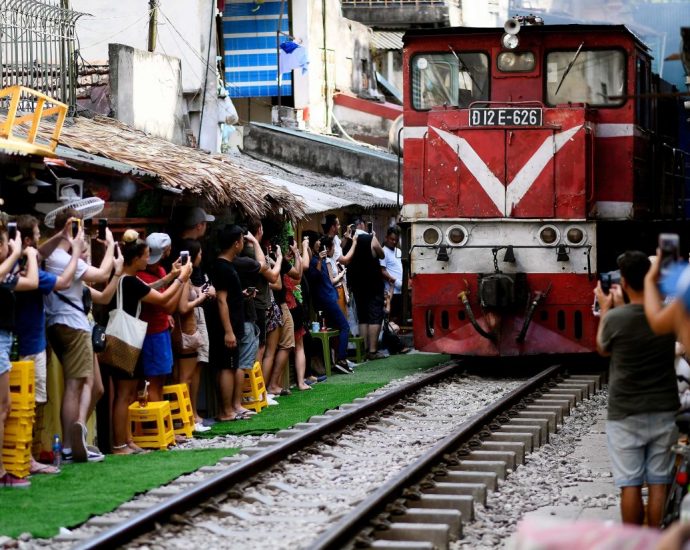 Hanoi's Instagram hotspot 'Train Street' cautiously reopens to tourists