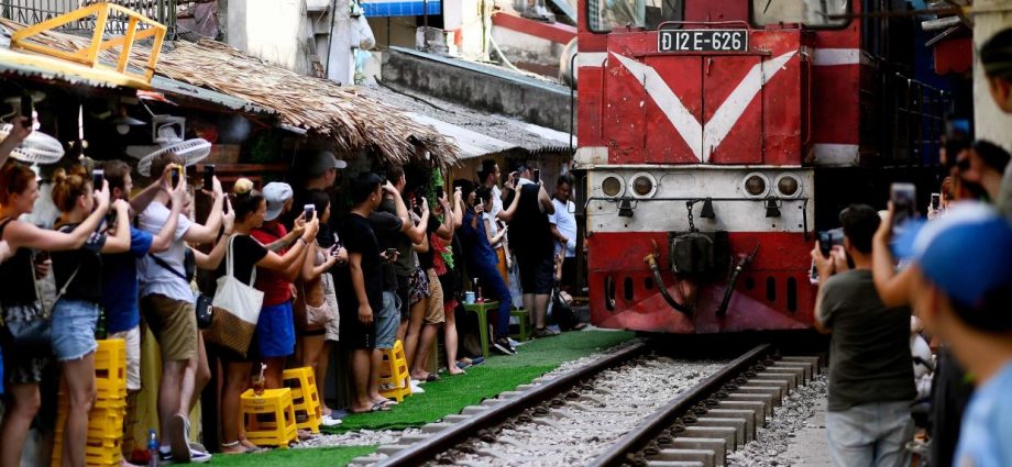 Hanoi's Instagram hotspot 'Train Street' cautiously reopens to tourists