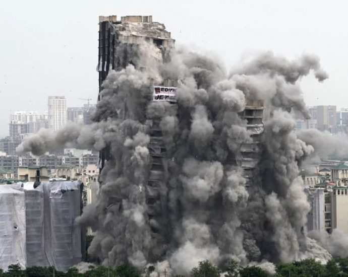 India demolishes illegal 100m ‘twin towers’ outside Delhi