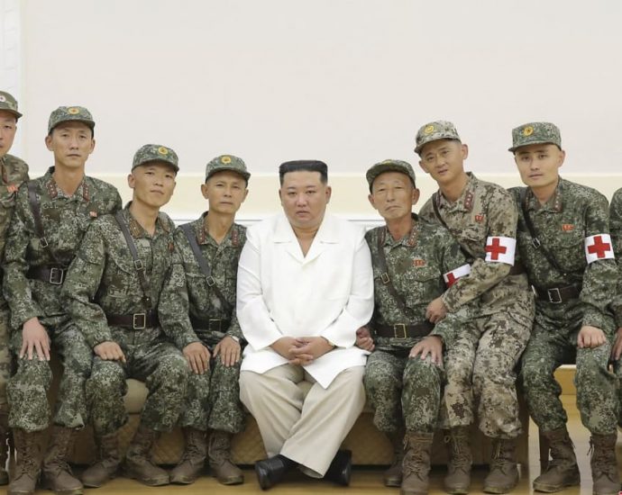 North Korea's Kim Jong Un praises military medics for frontline COVID-19 fight in capital