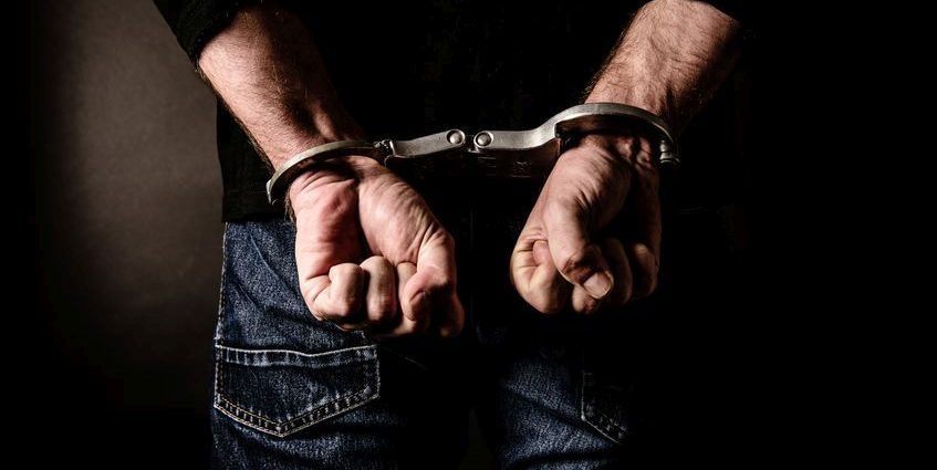 Police detain two suspects in investment scam, one still on the run