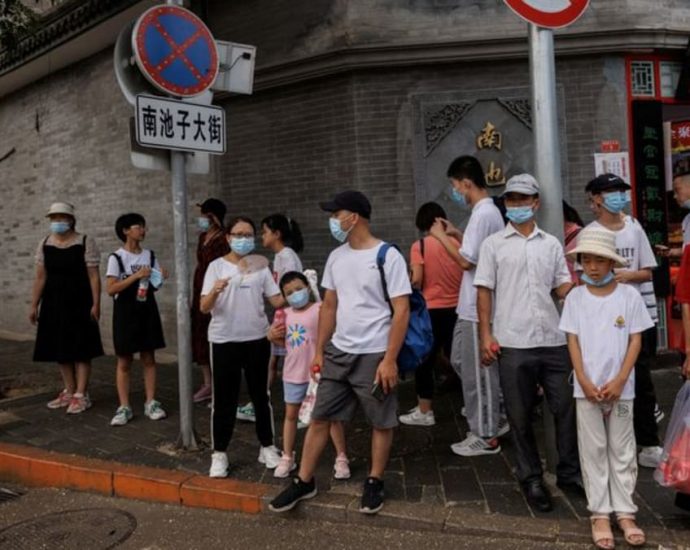 Several cities in China add COVID-19 curbs as millions still under lockdown