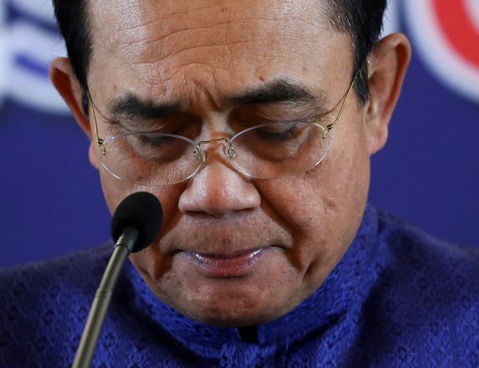 Suspended Thai PM Prayut says to continue as defence minister