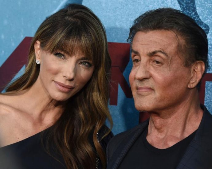 Sylvester Stallone says he and Jennifer Flavin are “amicably and privately addressing” their divorce