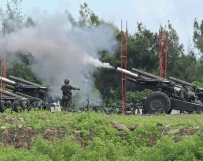 Taiwan holds military drill after China repeats threats