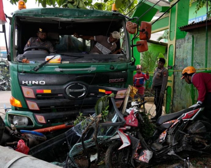 Ten killed in Indonesia in truck crash outside school