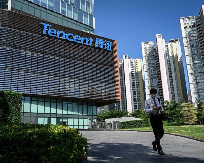 Tencent unveils first sales fall, job cuts as economy crumbles