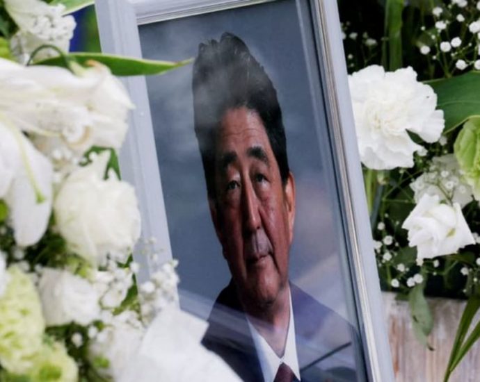 Unification Church members accuse Japanese media of bias over Abe killing