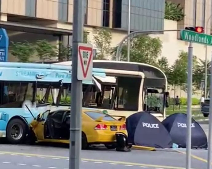 2 dead after car and bus collide at Woodlands junction