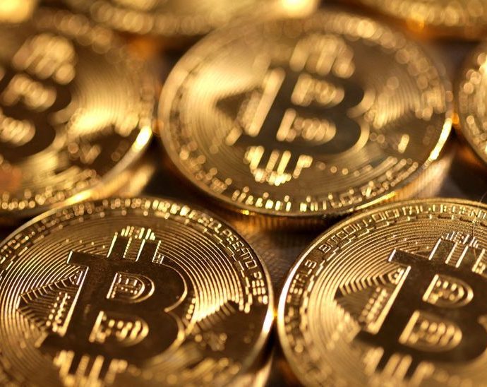 Bitcoin bounces above ,000 for first time in about a week