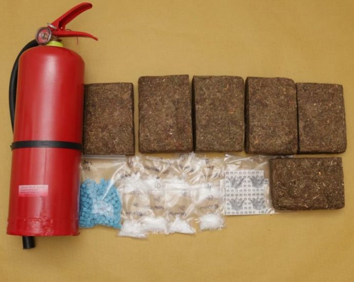 Cannabis hidden in fire extinguisher among 13kg of drugs seized in CNB raids