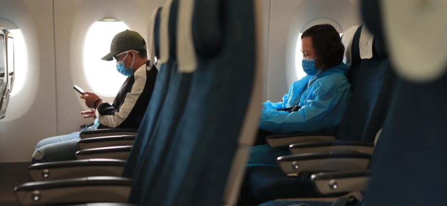 Commentary: No need to be too anxious about flying without a mask