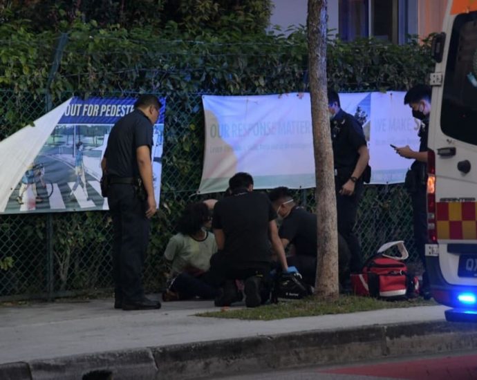 Elderly woman with knife causes commotion at Tampines St 82, later taken away in ambulance