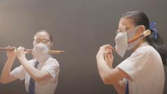 Hong Kong Covid: Double-masked flautists in ad spark ridicule