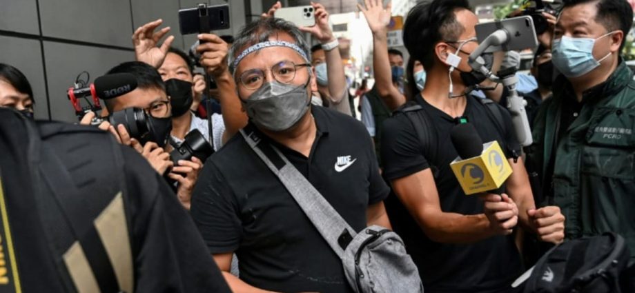 Hong Kong journalists union head charged before overseas trip