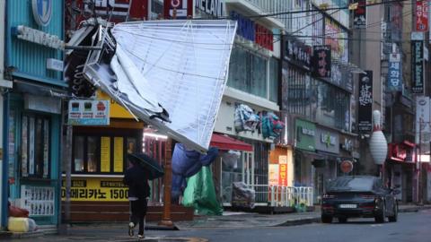 In pictures: Typhoon Hinnamnor wreaks devastation along South Korea coast