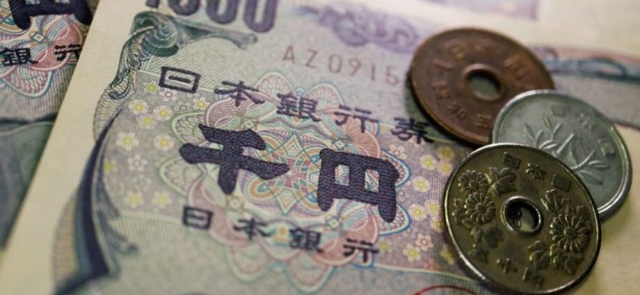 Japan’s finance minister warns of action as yen slides to 24-year low