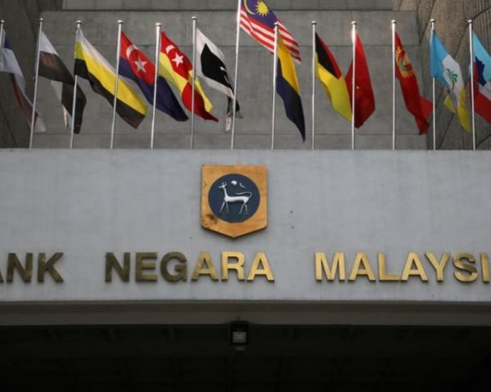 Malaysia central bank hikes key rate for third straight meeting