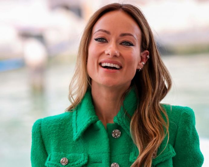 Olivia Wilde brings ‘Don’t Worry Darling’ to Venice, dismisses ‘endless tabloid gossip’ about the film