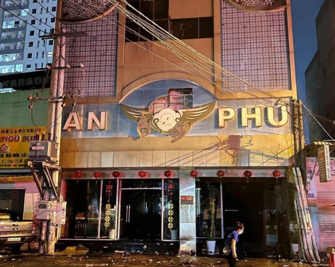 Owner of Vietnam karaoke bar arrested after blaze that killed 32