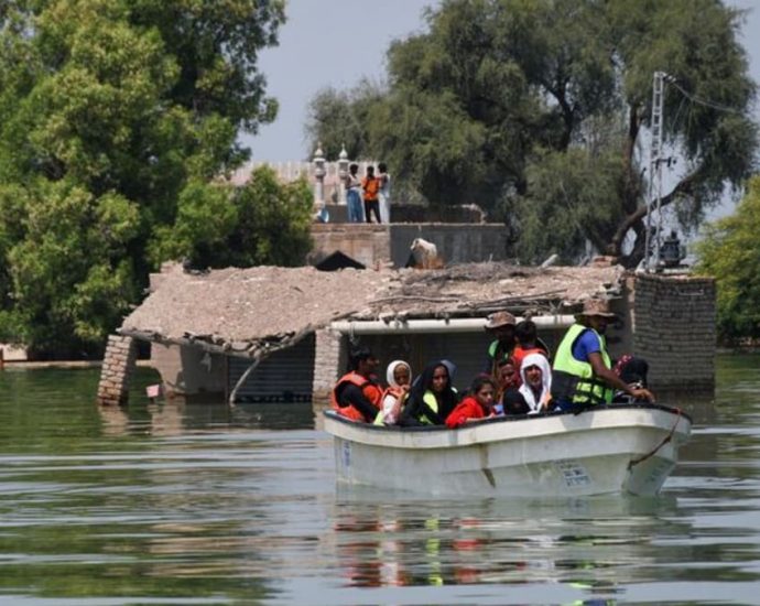 Pakistan races to keep floodwaters out of power station that supplies millions