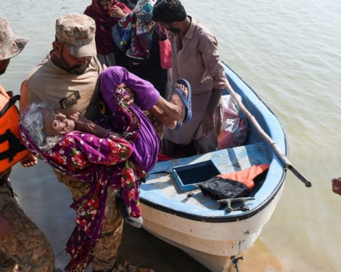 Pakistan to breach main highway to protect town of Dadu from floods