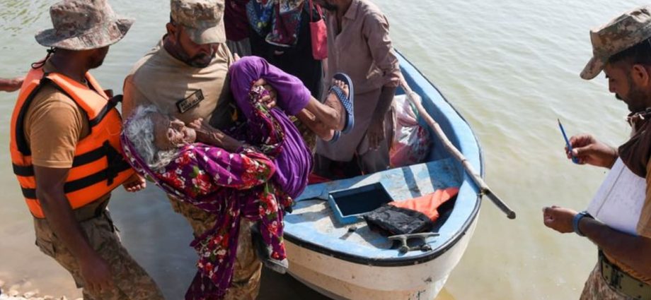 Pakistan to breach main highway to protect town of Dadu from floods