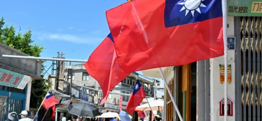 Taiwan says beauty queen barred from waving flag in Malaysia