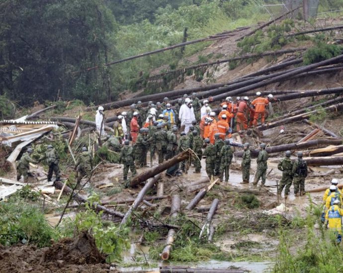 Typhoon batters Japan with record rain, killing one