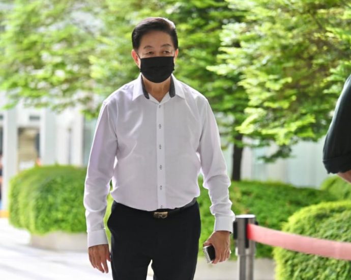 Undertaker Roland Tay charged with evading S7,000 in income tax, failing to register for GST