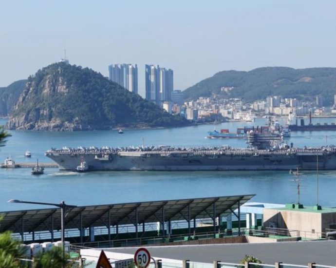 US aircraft carrier arrives in South Korea as warning to North