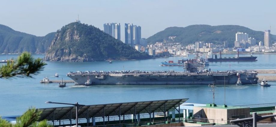 US aircraft carrier arrives in South Korea as warning to North