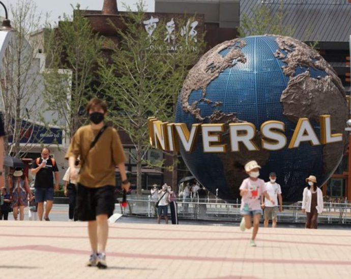 Beijing shuts Universal Resort, Wuhan locks down district in COVID-19 curbs