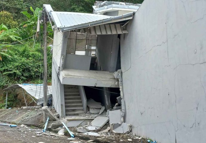 Buildings collapse in rain-soaked Phuket