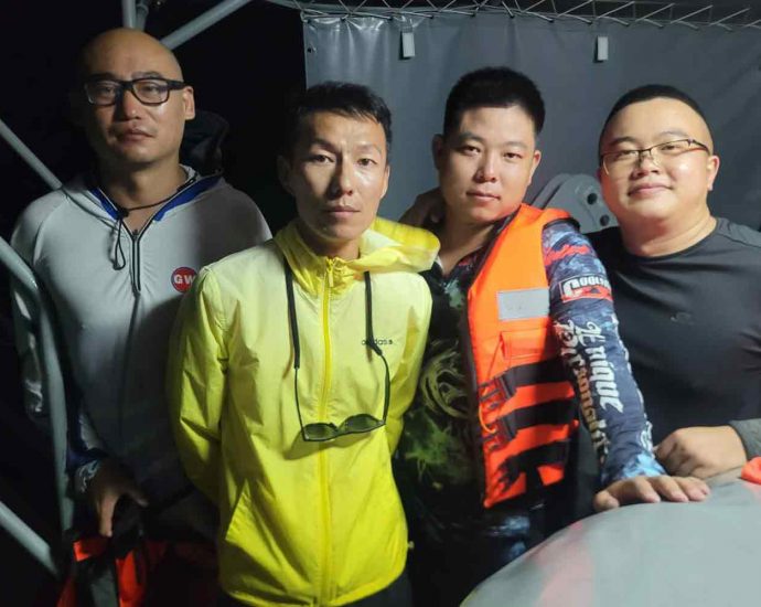 Businessmen rescued from broken down boat