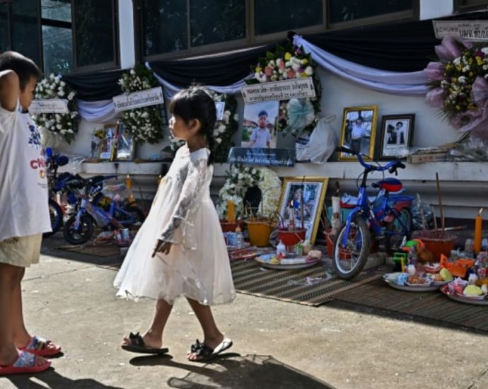 Families gather for mass cremation of Thai nursery victims