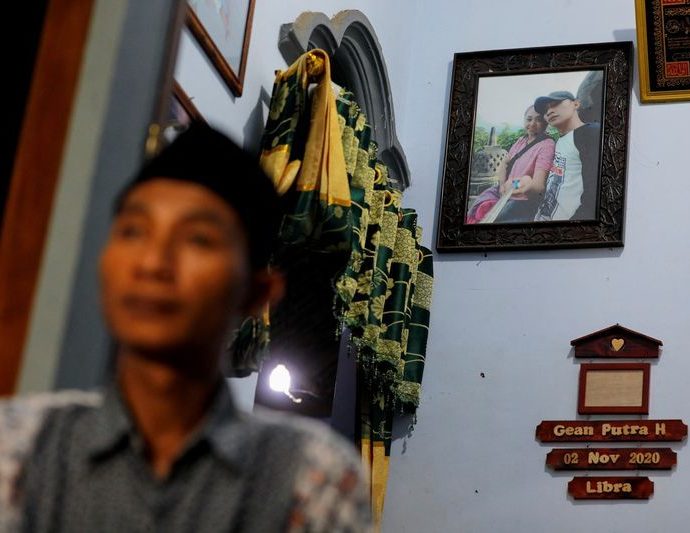 Fan loses wife, two teenage daughters in Indonesia soccer stampede