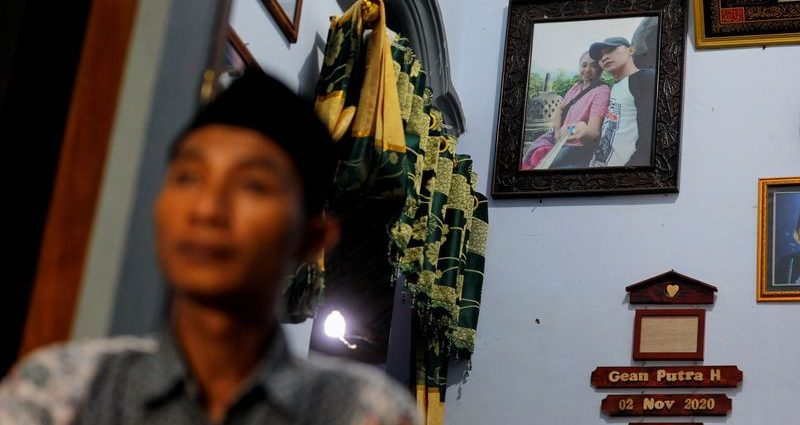 Finding their bodies: Indonesian fan's desperate search for family after soccer stampede