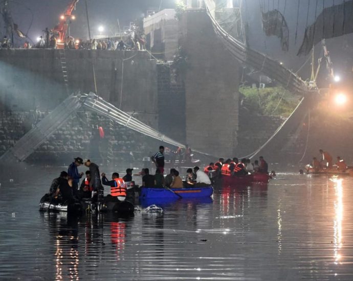 India bridge collapses, killing at least 120 people