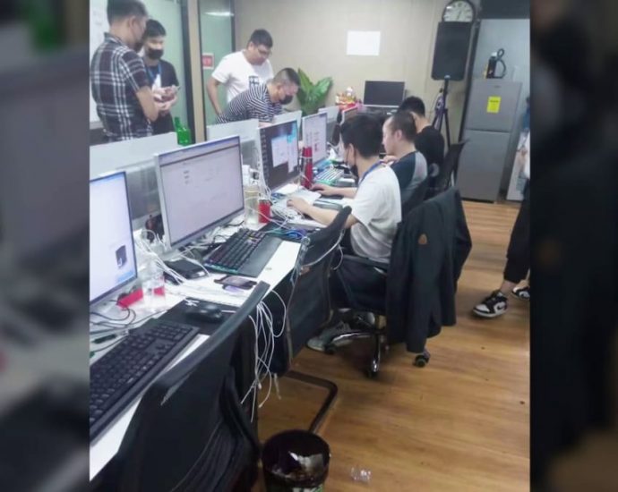 Inside the elaborate set-up of a scam HQ, staffed by people forced to scam