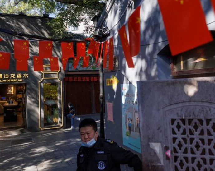 Security, red banners and COVID-19 curbs: Beijing readies for 20th Congress