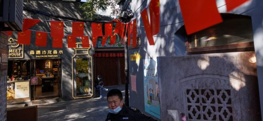 Security, red banners and COVID-19 curbs: Beijing readies for 20th Congress