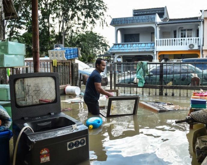 Some in Malaysia’s flood-prone areas question move to hold election during the monsoon